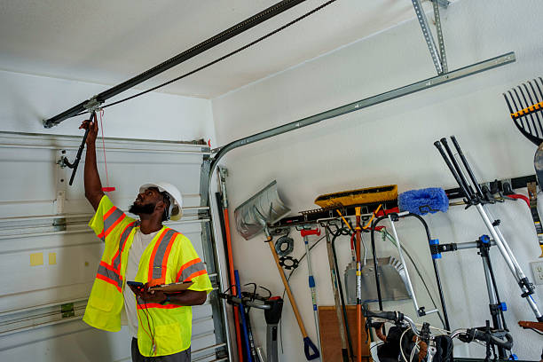 Professional Garage Door Panel Replacement technician working in Edgemont Park, MI